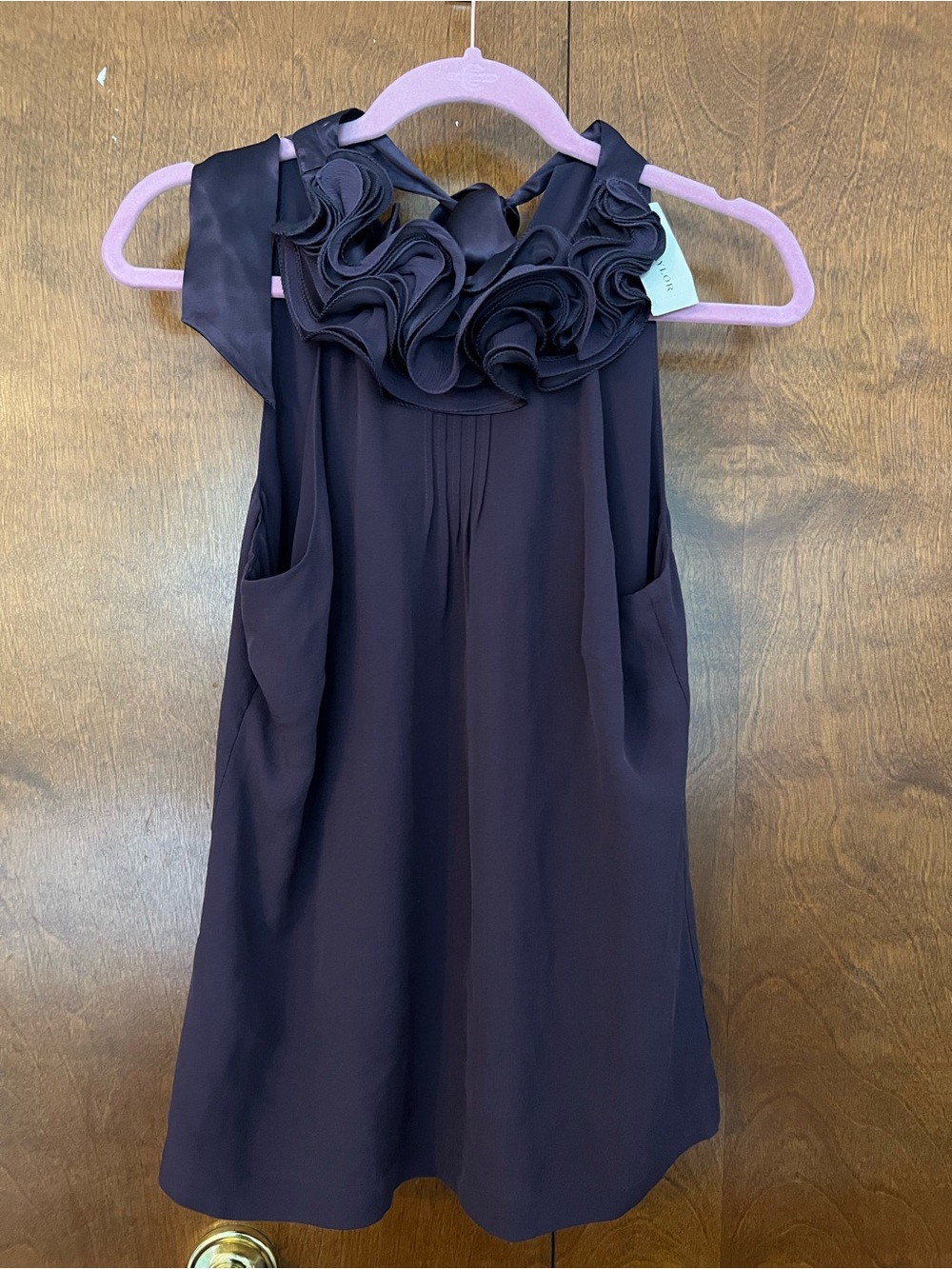 Womens Plum Sleeveless Top with Rosette Neckline